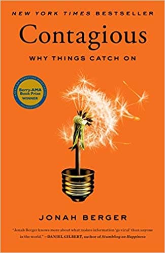 書籍封面:Jonah Berger 著《Contagious: Why Things Catch On》,橙色封面上有蒲公英與燈泡的組合圖